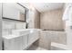 Elegant bathroom with double vanity, soaking tub, and modern fixtures at 8325 E Crestwood Way, Scottsdale, AZ 85250