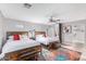 Bedroom with two twin beds and wood accents at 8325 E Crestwood Way, Scottsdale, AZ 85250