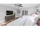 Bedroom with two twin beds and access to patio at 8325 E Crestwood Way, Scottsdale, AZ 85250