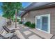 Private backyard patio with seating and shade structure during the day at 8325 E Crestwood Way, Scottsdale, AZ 85250