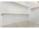 Large walk-in closet with ample shelving and hanging space at 19034 W Yucatan Dr, Surprise, AZ 85388
