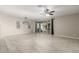 Living room with sliding glass doors that lead to the backyard at 19034 W Yucatan Dr, Surprise, AZ 85388