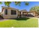 Spacious backyard with artificial turf and pergola at 19034 W Yucatan Dr, Surprise, AZ 85388