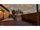 Outdoor kitchen, pizza oven, and hot tub area at 42715 N Courage Trl, Anthem, AZ 85086