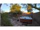 Backyard with hot tub and stone pathway at 42715 N Courage Trl, Anthem, AZ 85086