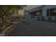 Landscaped backyard with hot tub and stone pathway at 42715 N Courage Trl, Anthem, AZ 85086