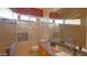 Bathroom with marble vanity, bathtub, and shower at 42715 N Courage Trl, Anthem, AZ 85086