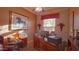 Home office with a large desk, computer, and printer at 42715 N Courage Trl, Anthem, AZ 85086