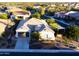 Single-story home with a two-car garage and landscaped yard at 42715 N Courage Trl, Anthem, AZ 85086