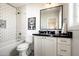 Charming bathroom with subway tile, pedestal sink, and patterned floor tiles at 88 N Country Club Dr, Phoenix, AZ 85014