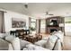 Spacious living room with sectional sofa, coffee table, and hardwood floors at 88 N Country Club Dr, Phoenix, AZ 85014