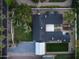 Aerial view showcasing the home's layout, landscaping, and surrounding area at 88 N Country Club Dr, Phoenix, AZ 85014