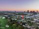 Aerial view showing the property's proximity to the city and golf course at 88 N Country Club Dr, Phoenix, AZ 85014
