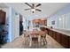 Kitchen boasts granite countertops, wood cabinets, and an island at 1095 W Desert Valley Dr, San Tan Valley, AZ 85143
