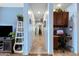 Hallway with built-in office and views into other rooms at 1095 W Desert Valley Dr, San Tan Valley, AZ 85143