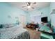 Charming bedroom with a crafting area and ceiling fan at 1095 W Desert Valley Dr, San Tan Valley, AZ 85143