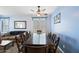 Dining area with a dark wood table and chairs at 1095 W Desert Valley Dr, San Tan Valley, AZ 85143