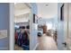 Bedroom with walk-in closet and adjacent bathroom at 1095 W Desert Valley Dr, San Tan Valley, AZ 85143