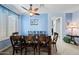 Dining room features a wooden table and six chairs at 1095 W Desert Valley Dr, San Tan Valley, AZ 85143