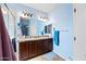 Double vanity bathroom with granite countertops at 1095 W Desert Valley Dr, San Tan Valley, AZ 85143