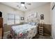 Serene bedroom featuring a floral-themed bedspread at 1095 W Desert Valley Dr, San Tan Valley, AZ 85143