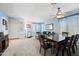 Dining area with wood table and access to the kitchen at 1095 W Desert Valley Dr, San Tan Valley, AZ 85143