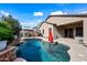 Entertain in style with this large pool and spacious backyard at 1095 W Desert Valley Dr, San Tan Valley, AZ 85143
