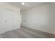 Bedroom with ceiling fan, double door closet and neutral carpeting at 5714 N 19Th Dr, Phoenix, AZ 85015