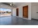 Attached garage with storage cabinets and epoxy floor at 5714 N 19Th Dr, Phoenix, AZ 85015