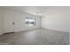 Bright and airy living room with tile floors and large window at 5714 N 19Th Dr, Phoenix, AZ 85015