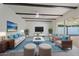 Living room with wood beams, tile floors, and stylish furniture at 5714 N 19Th Dr, Phoenix, AZ 85015