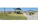 Modern playground with shade structures at 37600 N Cowboy Ln, San Tan Valley, AZ 85140