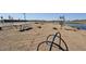 Community park with picnic tables, cornhole, and a pond at 37600 N Cowboy Ln, San Tan Valley, AZ 85140