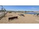Peaceful pond with benches and picnic tables at 37600 N Cowboy Ln, San Tan Valley, AZ 85140