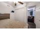 Bright bedroom with double bed and access to additional living space at 18202 N Cave Creek Rd # 115, Phoenix, AZ 85032