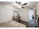 Well-lit bedroom with a dresser and access to a hallway at 18202 N Cave Creek Rd # 115, Phoenix, AZ 85032
