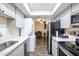 Clean and efficient kitchen, featuring modern appliances at 18202 N Cave Creek Rd # 115, Phoenix, AZ 85032