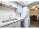 Modern kitchen with gray cabinets and stainless steel appliances at 18202 N Cave Creek Rd # 115, Phoenix, AZ 85032