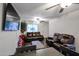 Open concept living room with dining area and comfy seating at 18202 N Cave Creek Rd # 115, Phoenix, AZ 85032