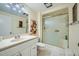 Clean bathroom with shower/tub combo and updated vanity at 12946 W Ashwood Dr, Sun City West, AZ 85375
