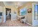 Cozy breakfast nook with table and chairs near kitchen at 12946 W Ashwood Dr, Sun City West, AZ 85375