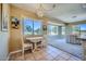 Breakfast nook with golf course view, table and chairs at 12946 W Ashwood Dr, Sun City West, AZ 85375