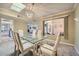 Spacious dining area with table and chairs, kitchen view at 12946 W Ashwood Dr, Sun City West, AZ 85375