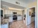 Kitchen with granite countertops and stainless steel appliances at 12946 W Ashwood Dr, Sun City West, AZ 85375