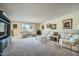 Spacious living room with ample natural light and comfortable seating at 12946 W Ashwood Dr, Sun City West, AZ 85375