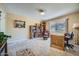 Home office with built-in bookshelves and a large desk at 12946 W Ashwood Dr, Sun City West, AZ 85375