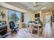 Home office with window, desk and chair, and great natural light at 12946 W Ashwood Dr, Sun City West, AZ 85375
