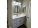 Updated bathroom with white vanity and quartz countertop at 15075 W Amelia Dr, Goodyear, AZ 85395
