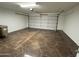Two-car garage with stained concrete floor at 15075 W Amelia Dr, Goodyear, AZ 85395