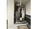 Image of home's furnace and water heater at 15075 W Amelia Dr, Goodyear, AZ 85395